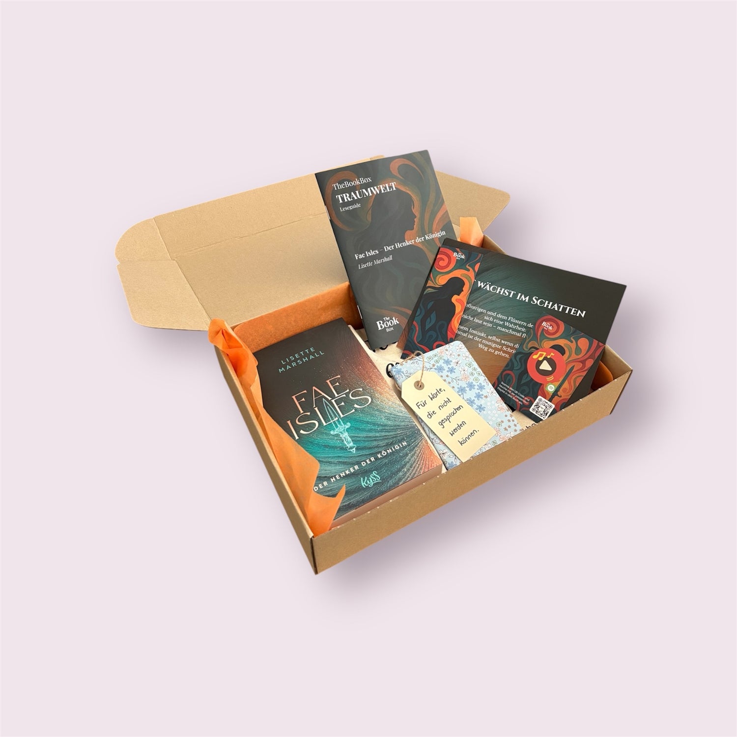 Monatliche Buchbox mit Leseguide und passende Extras